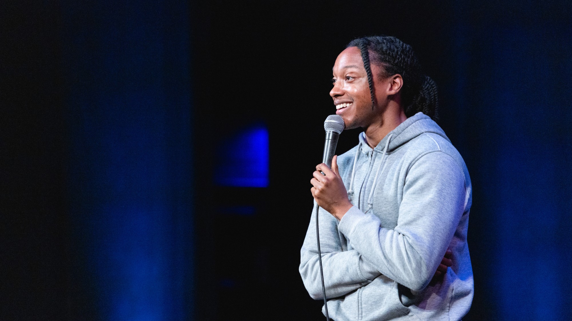 Comedian Josh Johnson performs a stand-up routine at a show in Austin, Texas.
